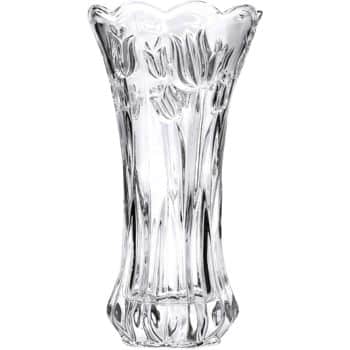 A clear glass vase with a scalloped rim and embossed tulip design. The vase is tall and cylindrical, tapering slightly at the base.