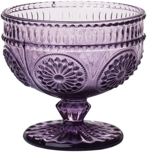 Ornate purple glass goblet with embossed floral and geometric patterns, a wide bowl, and a short, sturdy pedestal base—perfect for adding charm to your spring kitchen decor.