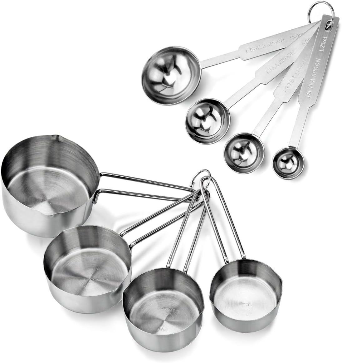 A set of four stainless steel measuring cups and five spoons, all nested together on a white background—essential tools whether you’re baking or learning how to make a tender juicy steak. Each set is attached by sturdy metal rings for easy storage.
