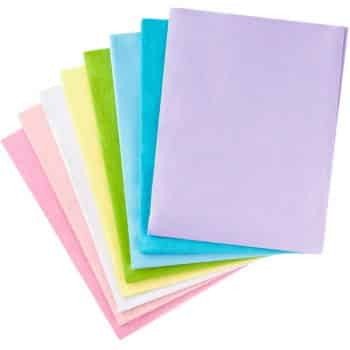 Seven sheets of letter-sized paper in pastel colors—pink, peach, yellow, green, blue, aqua, and lavender—fanned out against a white background, inspired by my favorite flower's delicate hues.