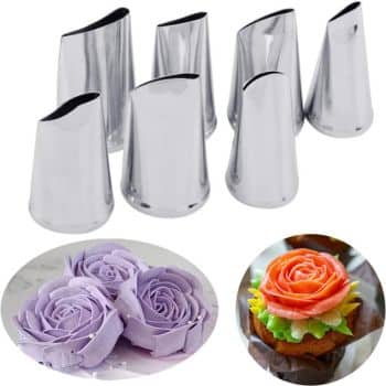 Seven metal piping tips are shown, each with a unique, angled opening. Below them, two decorated cupcakes feature my favorite flower inspiration: one with purple rose-like frosting, the other with multicolored flower-shaped designs.