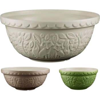 Three ceramic mixing bowls in cream, beige, and green, each featuring embossed woodland animal and leaf patterns—perfect for prepping ingredients for my favorite easy dinner ideas. The largest bowl is cream, the medium is beige, and the smallest is green.