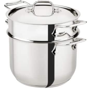 A shiny stainless steel stock pot with a lid and a steamer insert, featuring sturdy handles and a polished reflective surface—perfect for preparing my favorite easy dinner ideas.