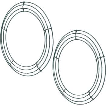 Two round green wire wreath frames with three concentric rings, each divided into segments by several crossbars—perfect bases for my favorite flower crafts—are displayed on a white background.