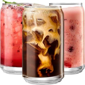 Three of my favorite summer drinks in clear, short glasses: one with ice and a pink berry drink, one with swirling cream in iced coffee, and another pink drink with berry pieces and bubbles.