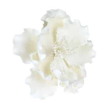 A white, ruffled artificial flower with softly layered petals and delicate white stamens at the center, reminiscent of my favorite floral desserts, displayed on a plain white background.