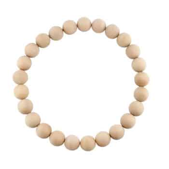 A circular bracelet made of evenly spaced, smooth, round wooden beads, displayed on a white background—it's my favorite summer decor to make for adding a natural touch to any space.