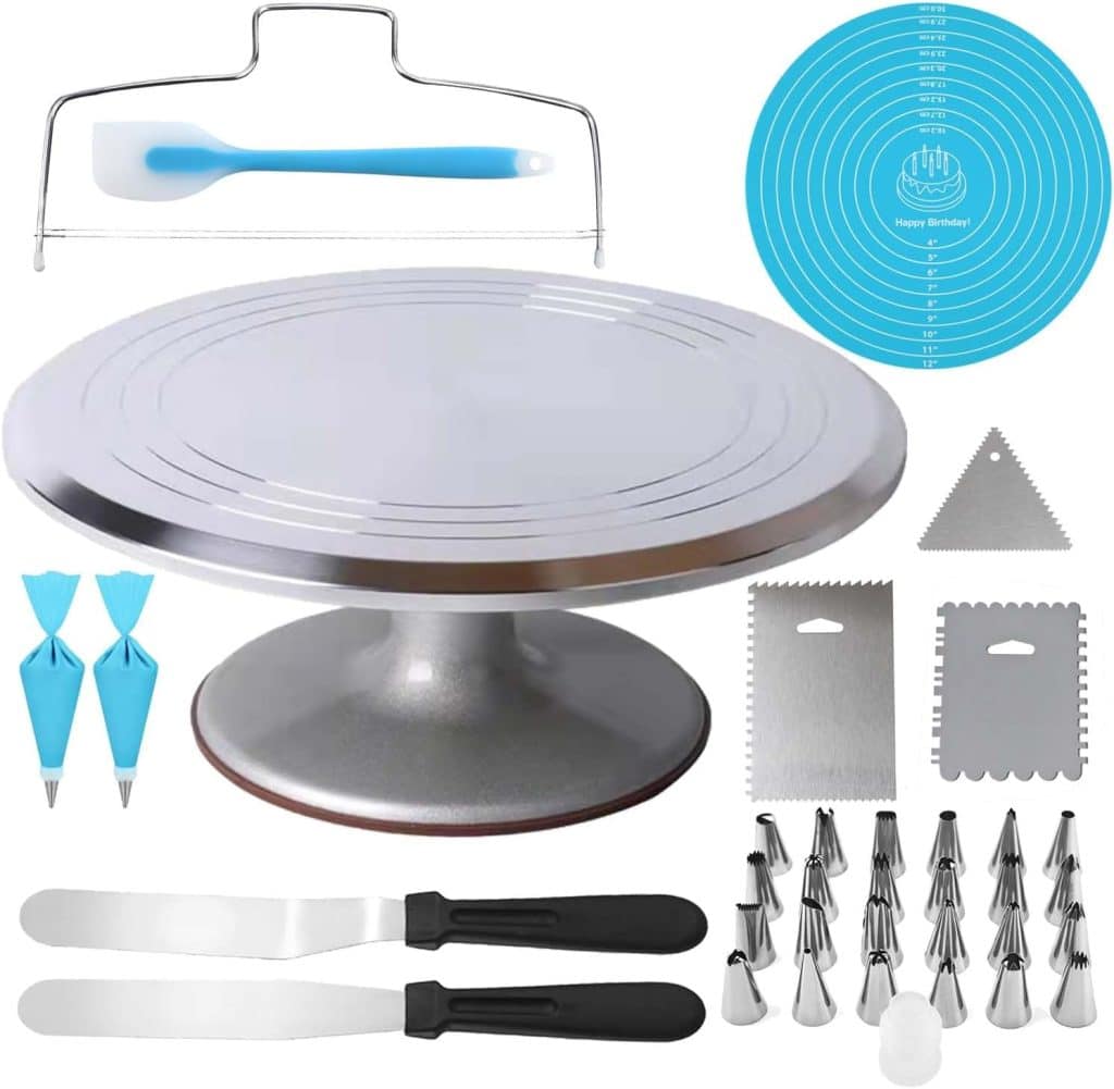 Cake decorating kit for making my favorite cakes features a metal turntable, spatula, cake leveler, silicone mat, piping bags, assorted metal icing tips, scrapers, and two offset spatulas with black handles—all arranged neatly on a white background.
