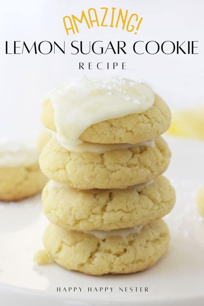 A stack of four lemon sugar cookies with white icing on top, placed on a white surface. Text above reads "Amazing! Lemon Sugar Cookie Recipe." Discover the best lemon sugar cookie recipe by Happy Happy Nester.