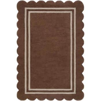 A rectangular brown rug with scalloped edges and two white rectangular borders near the edges.
