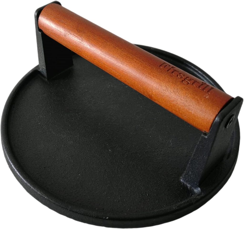 A round, black cast iron grill press with a smooth, flat base and a wooden handle across the top—perfect for making classic dishes like the flying dutchman burger recipe.