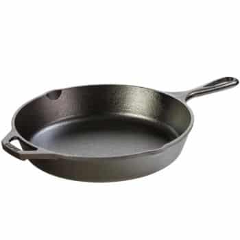 A black cast iron skillet with a handle and a small helper handle on the opposite side, shown against a white background—an essential tool for preparing my favorite Thanksgiving recipes.