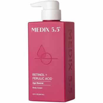 A pink pump bottle of Medix 5.5 Retinol + Ferulic Acid Age Rewind Body Cream, 15 fl oz, with simple graphics and text on the front.