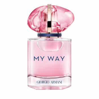 A clear glass bottle of pink perfume labeled "MY WAY" and "GIORGIO ARMANI," with a pink, rounded cap accented with gold and blue details.