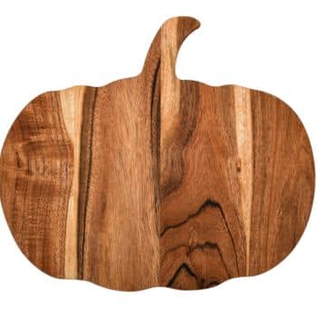 A wooden cutting board shaped like a pumpkin, perfect for fans of all things pumpkin, featuring natural wood grain patterns and a small stem at the top.