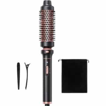 A black and rose gold heated hair styling brush with bristles, shown with a hair clip, a sectioning pin, and a black drawstring storage pouch.