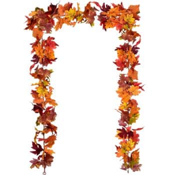 A decorative garland made of artificial autumn leaves in red, orange, yellow, and brown arranges in a rectangular arch shape—my favorite Thanksgiving decor for adding festive warmth to any space.