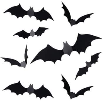 Eight black silhouette bats of various sizes are flying in different directions against a white background, making perfect wall crafts for fall.