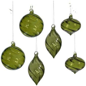 Six green glass Christmas ornaments, three round and three teardrop-shaped, hang on thin transparent strings against a white background. The ornaments have a swirled pattern and a shiny surface.