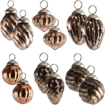 Eight vintage-style glass Christmas ornaments in shades of copper and bronze, each with a unique ridged or textured pattern and silver metal caps with hanging loops.