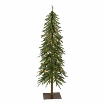 A slim, artificial Christmas tree with sparse green branches and small white lights, standing on a square metal base against a plain white background.