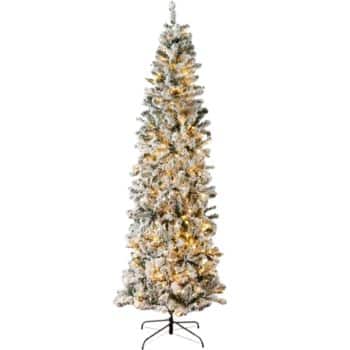 A tall, slim artificial Christmas tree with a snow-frosted appearance, decorated with warm white lights and standing on a black metal stand.