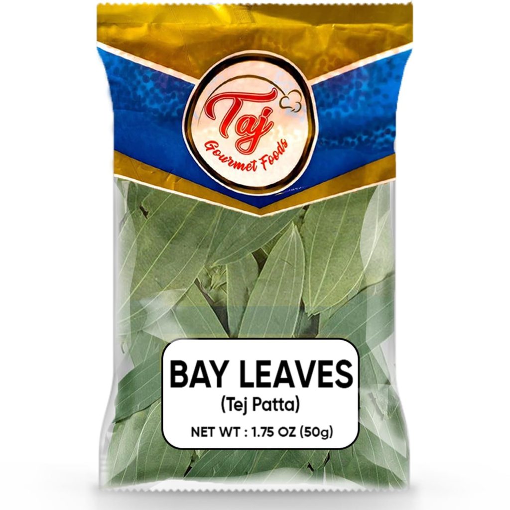 A clear plastic package of Taj Gourmet Foods Bay Leaves (Tej Patta), 1.75 oz (50g), perfect for simmer pot recipes or as unique gifts. The white label features bold black text, and the blue and gold top adds a touch of elegance.