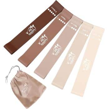 Four resistance bands in varying shades of brown and beige, each labeled with a different strength level, are laid out next to a matching beige drawstring pouch.