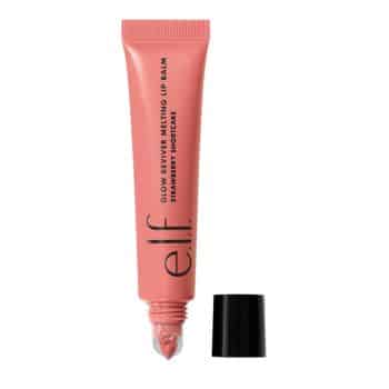 A pink tube of e.l.f. Glow Reviver Melting Lip Balm in the shade "Strawberry Shortcake" with the cap removed and placed next to the tube, showing the applicator tip.