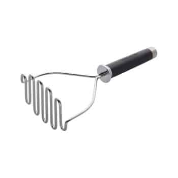A stainless steel potato masher with a zigzag-shaped mashing head and a black handle, shown against a plain white background.