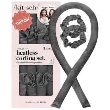 A kit of satin heatless curling set by Kitsch, including a long curling rod and two scrunchies in gray. The packaging shows before and after hair photos and a "Viral on TikTok" label.