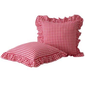 Two pillows with red and white checkered patterns and ruffled edges, one standing upright and the other lying flat, on a plain white background.
