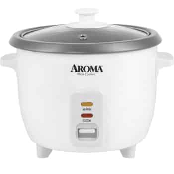 A white Aroma rice cooker with a glass lid, featuring two indicator lights labeled "WARM" and "COOK" above a single switch button on the front. The appliance has side handles and a simple, compact design.