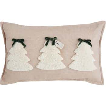 Rectangular beige pillow with three white textured Christmas tree designs, each topped with a green ribbon; the middle tree has a small tag that says "joy.