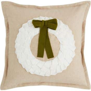 A beige square throw pillow featuring a white wreath made of fabric and a green bow design on the front.