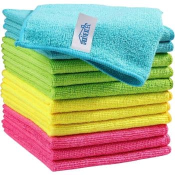 A stack of microfiber cleaning cloths in bright colors—blue, green, yellow, and pink—with a blue cloth labeled “Gryeer” placed on top.