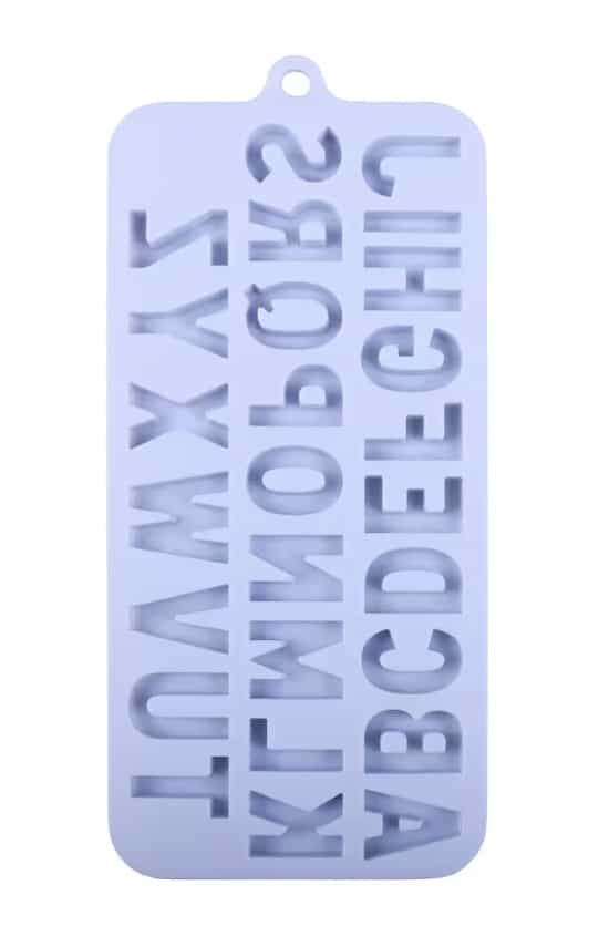 A white silicone mold with cavities shaped like the uppercase letters of the English alphabet, arranged in rows—perfect for personalized treats or trying a heart shaped brownies recipe with an educational twist.