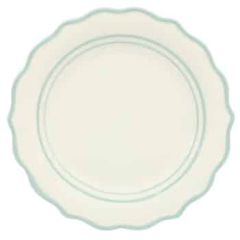 A white ceramic plate with a scalloped edge and two light blue concentric rings near the rim, viewed from above on a plain background.