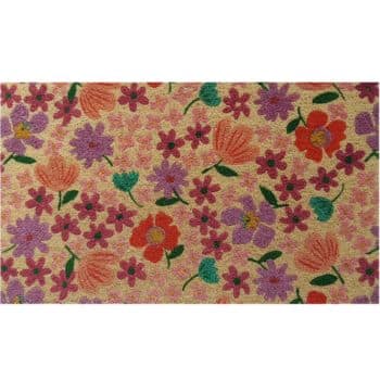 A rectangular mat with a colorful floral pattern featuring red, orange, purple, and pink flowers with green leaves on a light pink background.