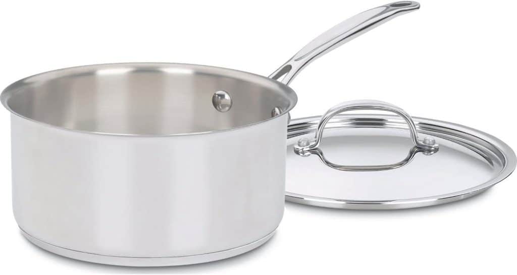 A stainless steel saucepan with a long handle, perfect for preparing a chocolate covered quinoa recipe, is shown with its matching lid placed beside it on a white background. The saucepan is empty and slightly reflective.