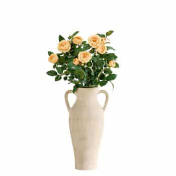 A beige ceramic vase with two handles holds a bouquet of yellow roses and green leaves against a plain white background.