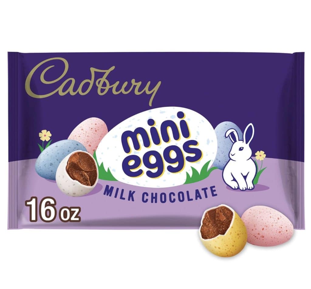 A 16 oz bag of Cadbury Mini Eggs Milk Chocolate features pastel candy eggs, a white bunny, and a large white egg with "mini eggs" text on a purple background—perfect for decorating your Easter bundt cake or enjoying as a festive treat.