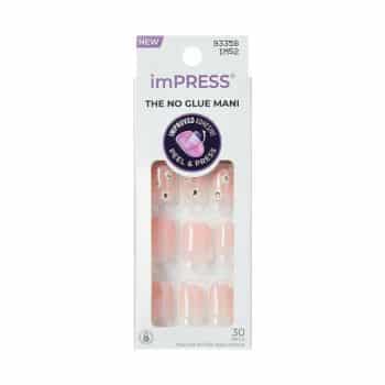 A package of imPRESS press-on nails in a light pink shade, labeled "The No Glue Mani" with "improved adhesive" and "peel & press" features. The pack contains 30 nails displayed in a white box.