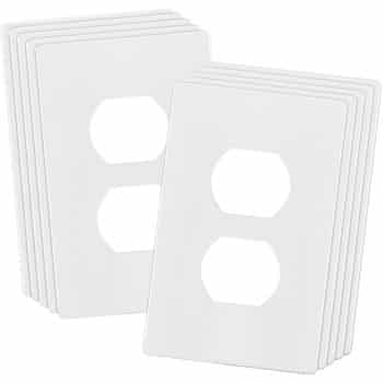 A stack of white rectangular electrical outlet cover plates with two circular openings on each, arranged side by side on a white background.