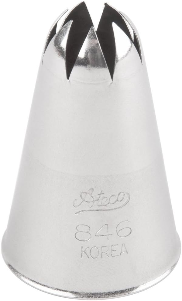 A metal piping tip with a jagged, star-shaped opening at the top, perfect for crafting swirls or adding texture to your meringue cookies recipe, engraved with "Ateco 846 KOREA" on the front.
