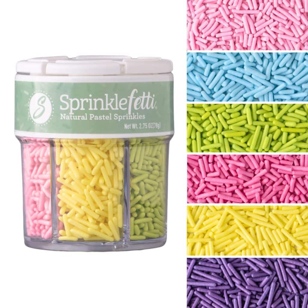 A container labeled "Sprinklefetti Natural Pastel Sprinkles" is divided into sections holding pastel sprinkles—perfect for topping your favorite meringue cookies recipe. Beside it, close-up strips show pink, blue, green, yellow, and purple sprinkles.