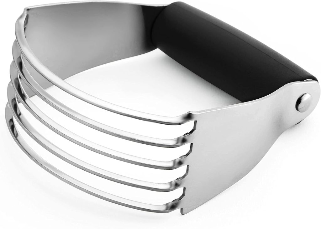 A stainless steel pastry blender with four curved blades and a black ergonomic handle, perfect for mixing butter into flour when making your favorite Irish Soda Bread recipe.