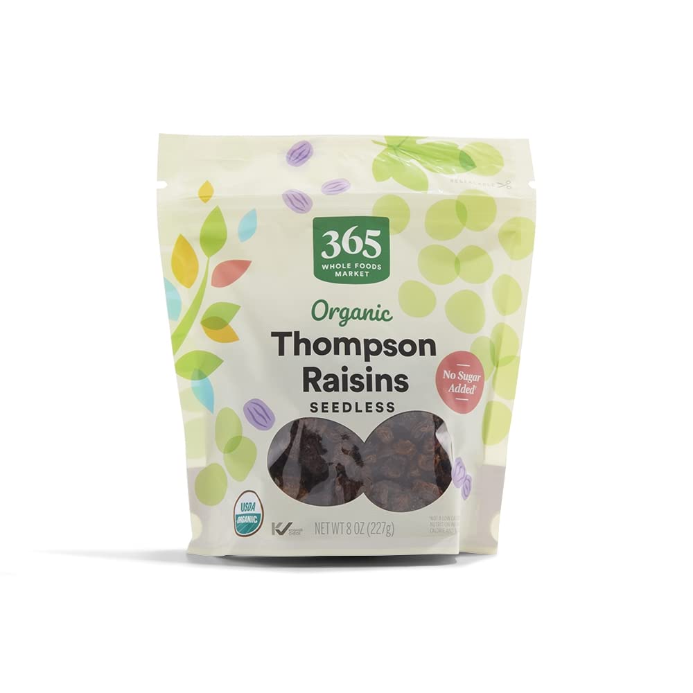 A package of 365 Whole Foods Market Organic Thompson Raisins, seedless, with a "No Sugar Added" label—perfect for your Irish Soda Bread recipe. The resealable 8 oz (227 g) bag features colorful leaves and grape illustrations.