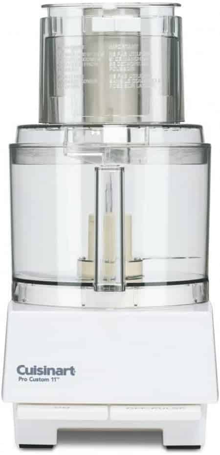 A white Cuisinart Pro Custom 11 food processor with a clear plastic bowl and lid, viewed from the front—perfect for prepping ingredients for your favorite fried wonton recipe, showing the blade and control panel at the base.