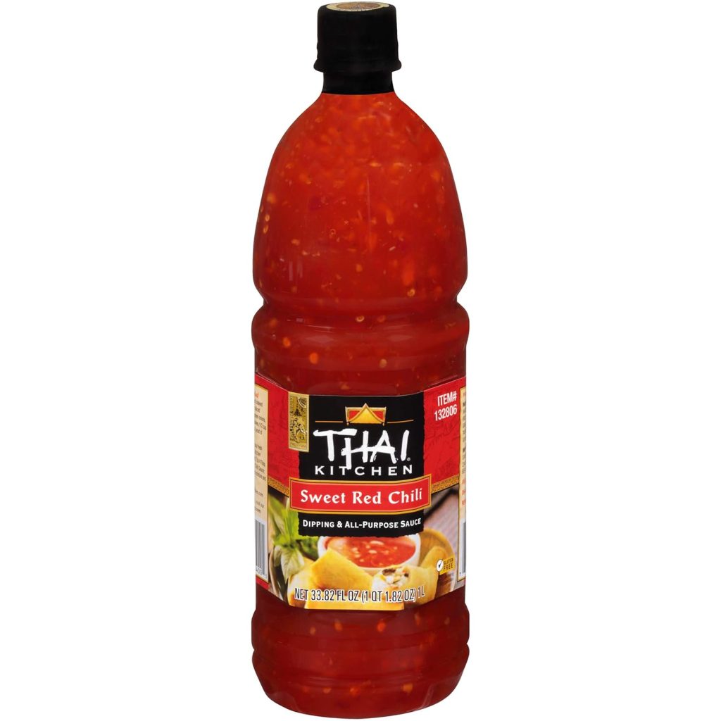 A 33.82 fl oz bottle of Thai Kitchen Sweet Red Chili dipping and all-purpose sauce with a black cap and a label featuring images of red chili peppers—perfect for your favorite fried wonton recipe.